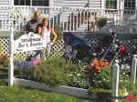 Barbara and Dave in front of house Barbara and Dave in front of house